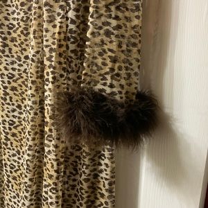 Sheer Vintage Negligee in an animal print. Gown has adjustable straps Faux cuffs